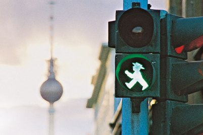 The Ampelmännchen is a beloved symbol in Eastern Germany, "enjoy[ing] the privileged status of being one of the few features of communist East Germany to have survived the end of the Iron Curtain with his popularity unscathed." After the fall of the Berlin Wall, the Ampelmännchen acquired cult status and became a popular souvenir item in the tourism business.
